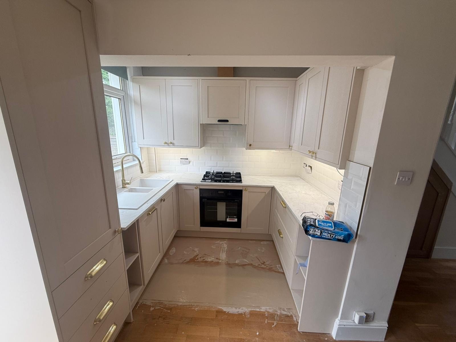 OJR Joinery kitchen fitting project with shaker-style cabinets and worktops
